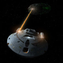 Voyager using her phaser arrays against a Borg probe.