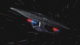 A Galaxy-class ship at warp.