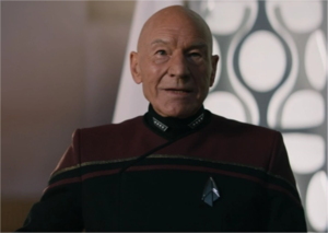 Admiral Jean Luc-Picard (retired) serving as the Chancellor of Starfleet Academy.